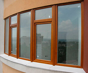 Остекление балконов деревянными окнами